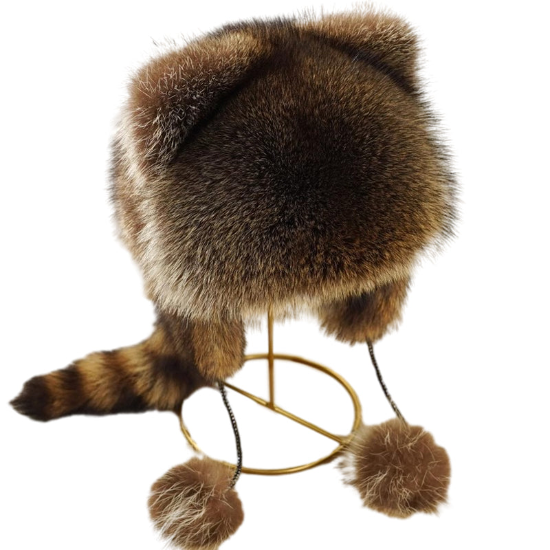Warme wintermuts van imitatiebont met pompons