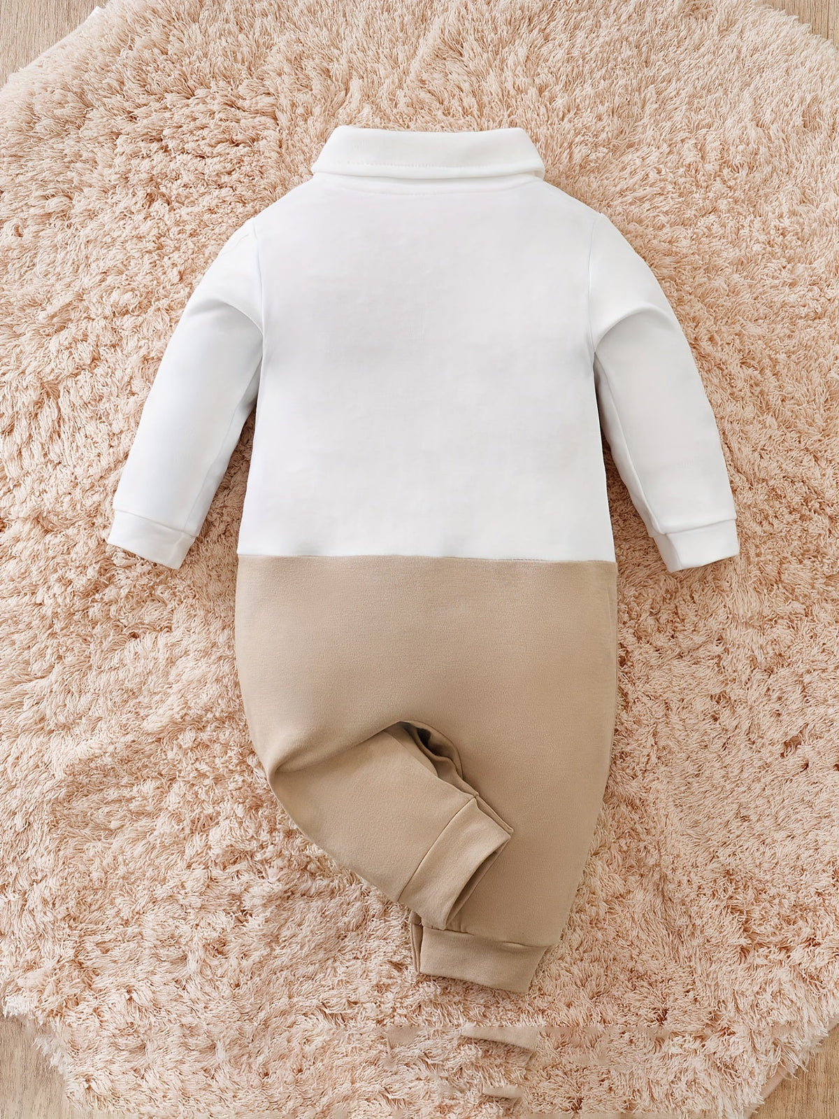 Babyromper met vlinderdas