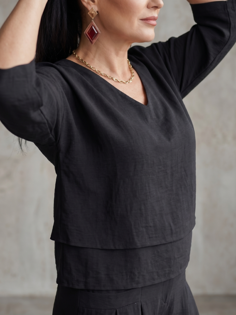 Dames set in laagjeslook met wijde pijpen