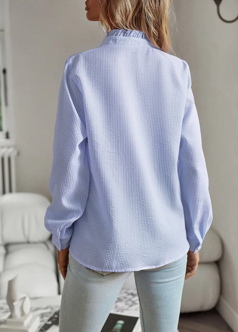 Damesblouse met lange mouwen en ruches