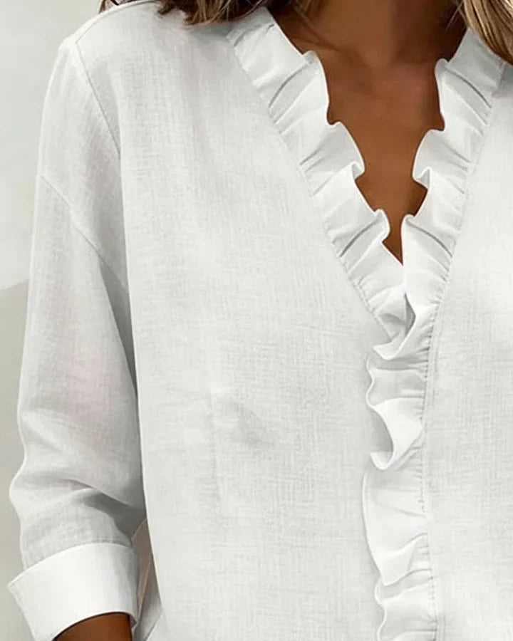 Damesblouse met lange mouwen, V-hals en roesjes