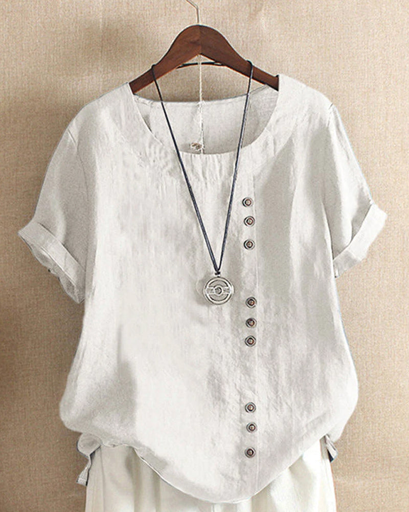 Damestop met korte mouwen en elegante knoopdetails