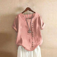 Elegante damesblouse met korte mouwen en knoopdetails