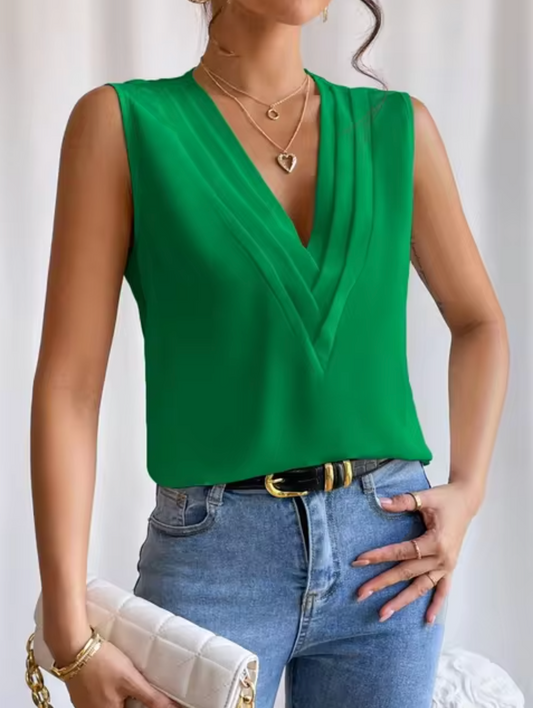 Elegante mouwloze damestop met plissé en V-hals