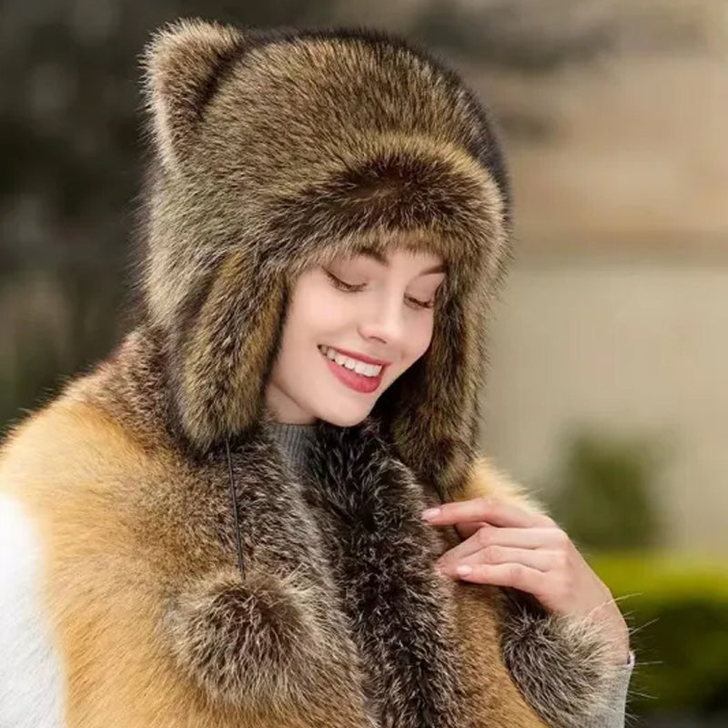 Warme wintermuts van imitatiebont met pompons