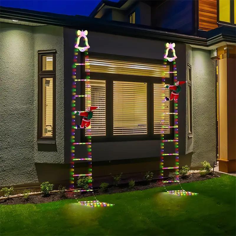 Geanimeerde kerstverlichting op ladder met klimmende Kerstman en afstandsbediening