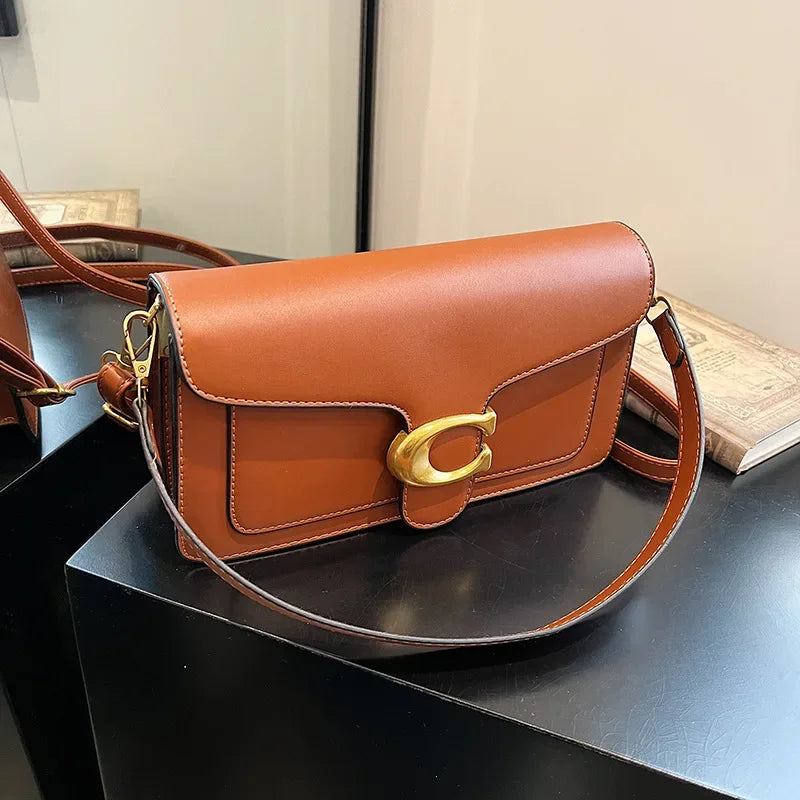 Minimalistische vierkante schouder- en crossbodytas