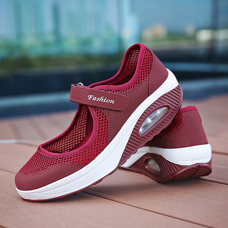 Modieuze ademende damessneakers