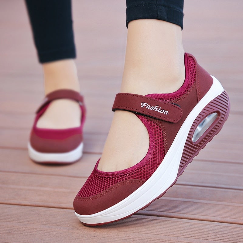 Modieuze ademende damessneakers