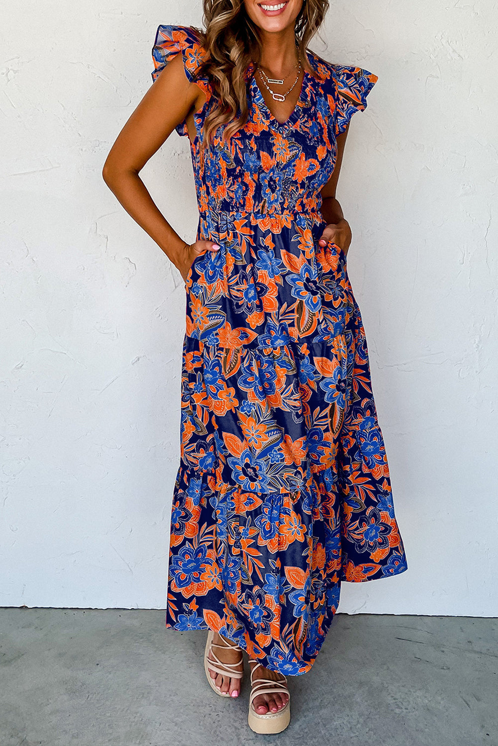 Zomerse maxi-jurk voor dames met smockwerk en bloemenprint