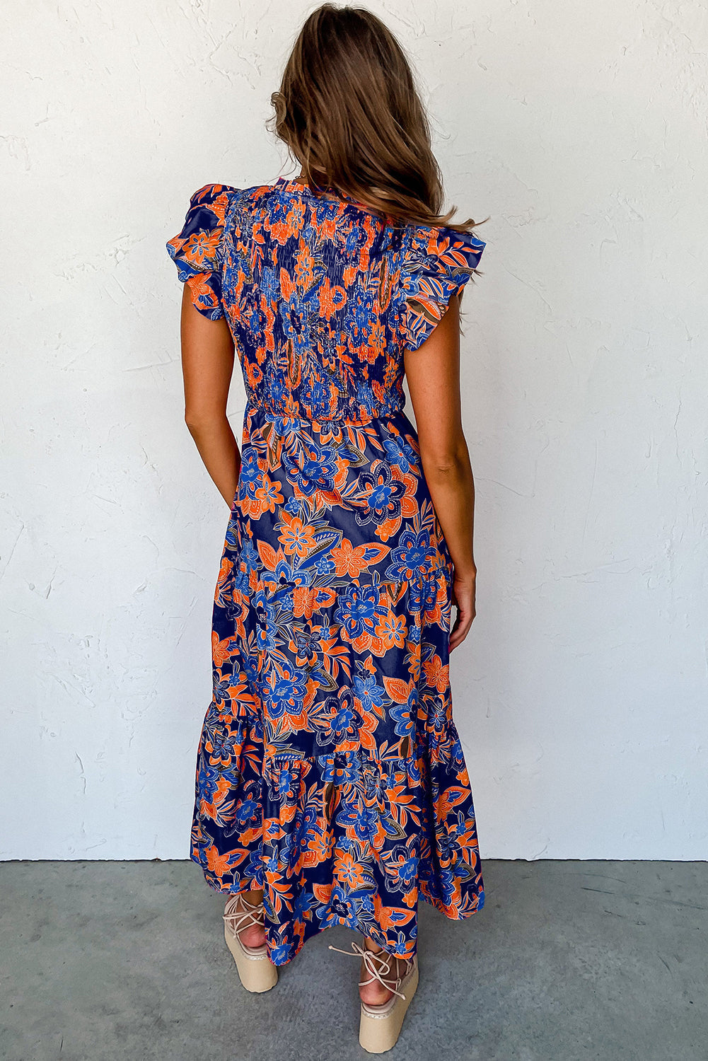 Zomerse maxi-jurk voor dames met smockwerk en bloemenprint